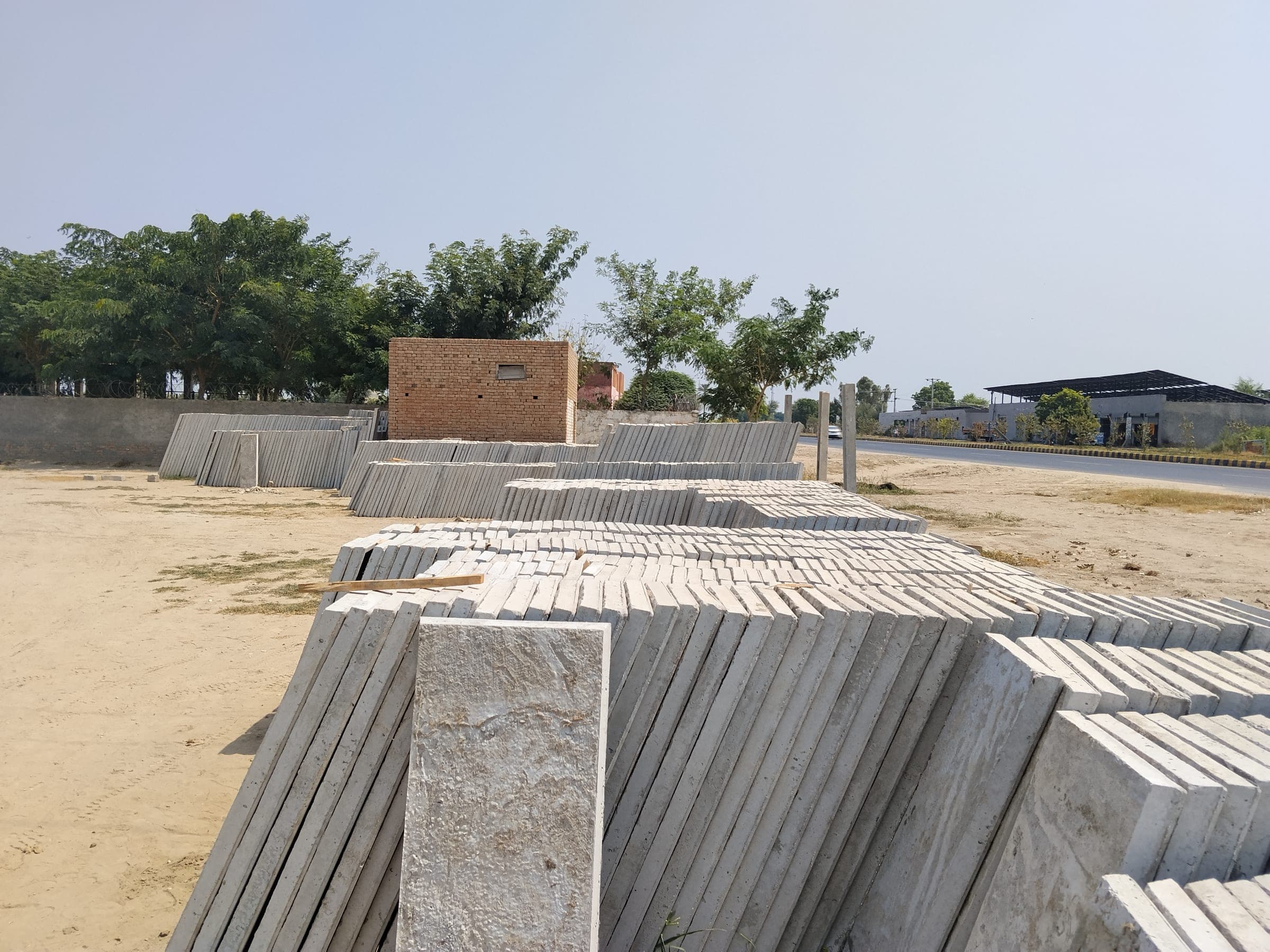 Rows of precast concrete roof slabs stacked in the Alfalah Concrete yard